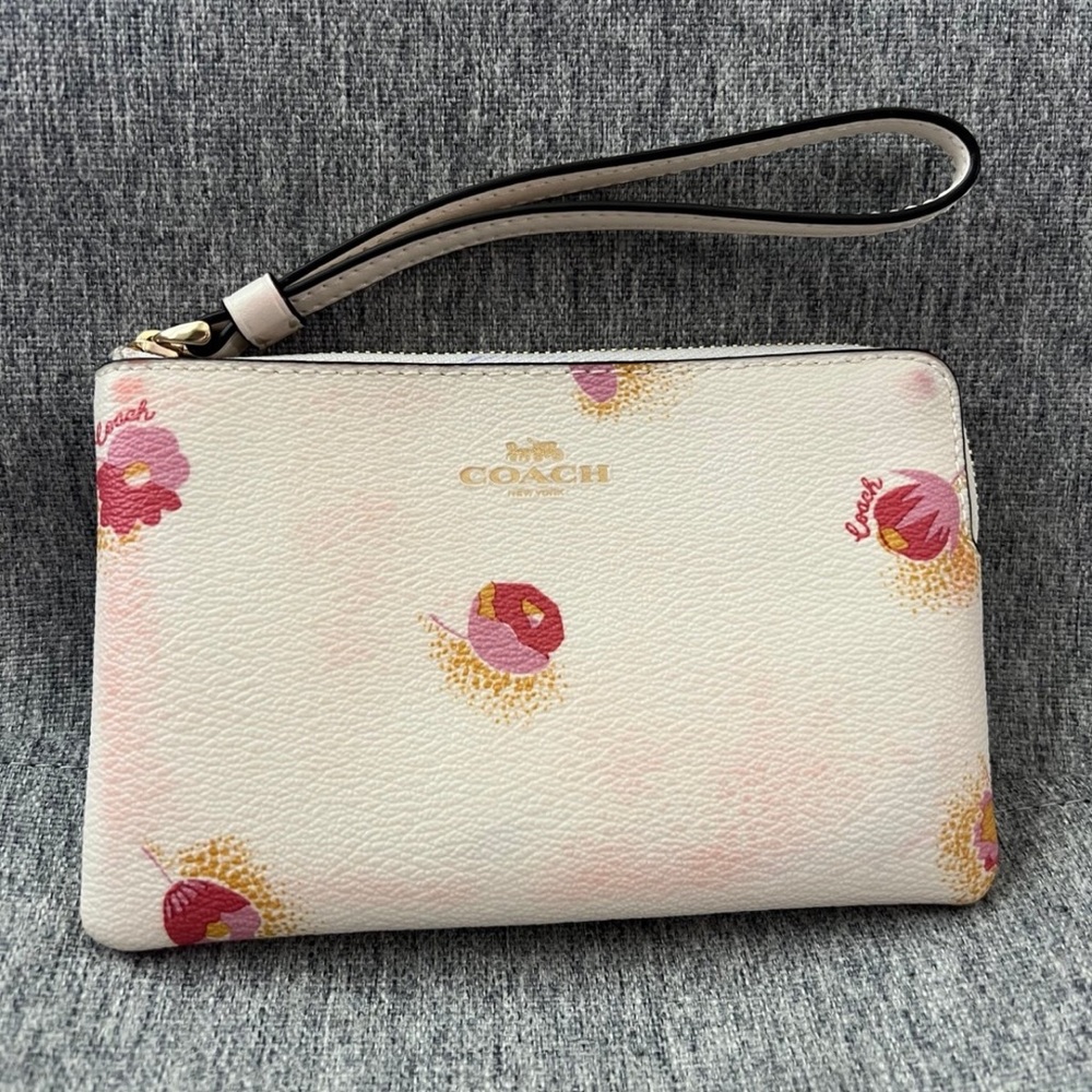 Coach corner zip wristlet with pop flower print